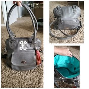 Initials Inc bag with H initial and tassel